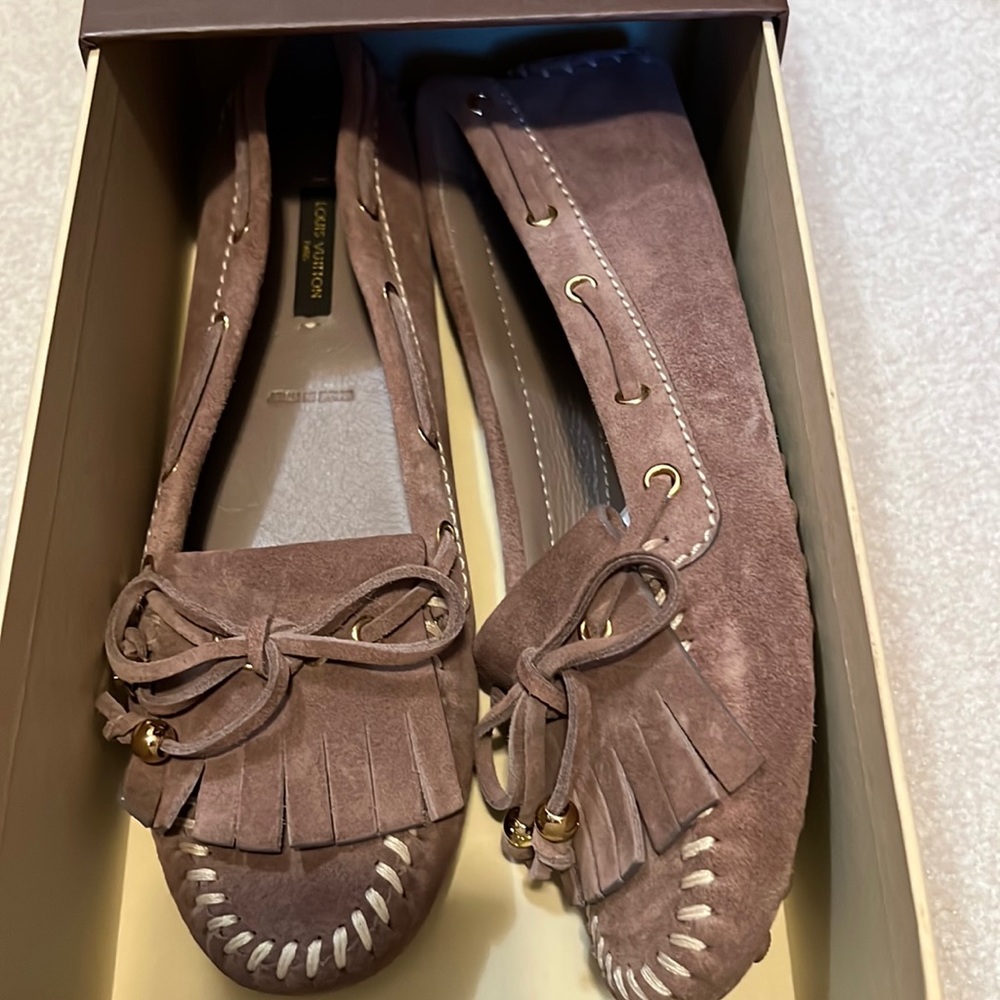 Louis Vuitton - loafers . These are unworn in excellent condition .